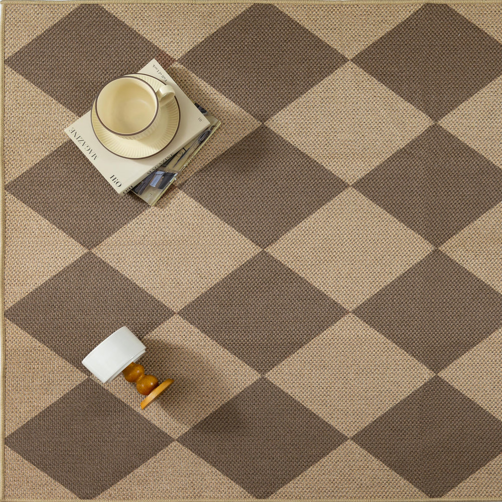 PureCozy 2x3 Brown Checkered Area Rug being cleaned with a vacuum