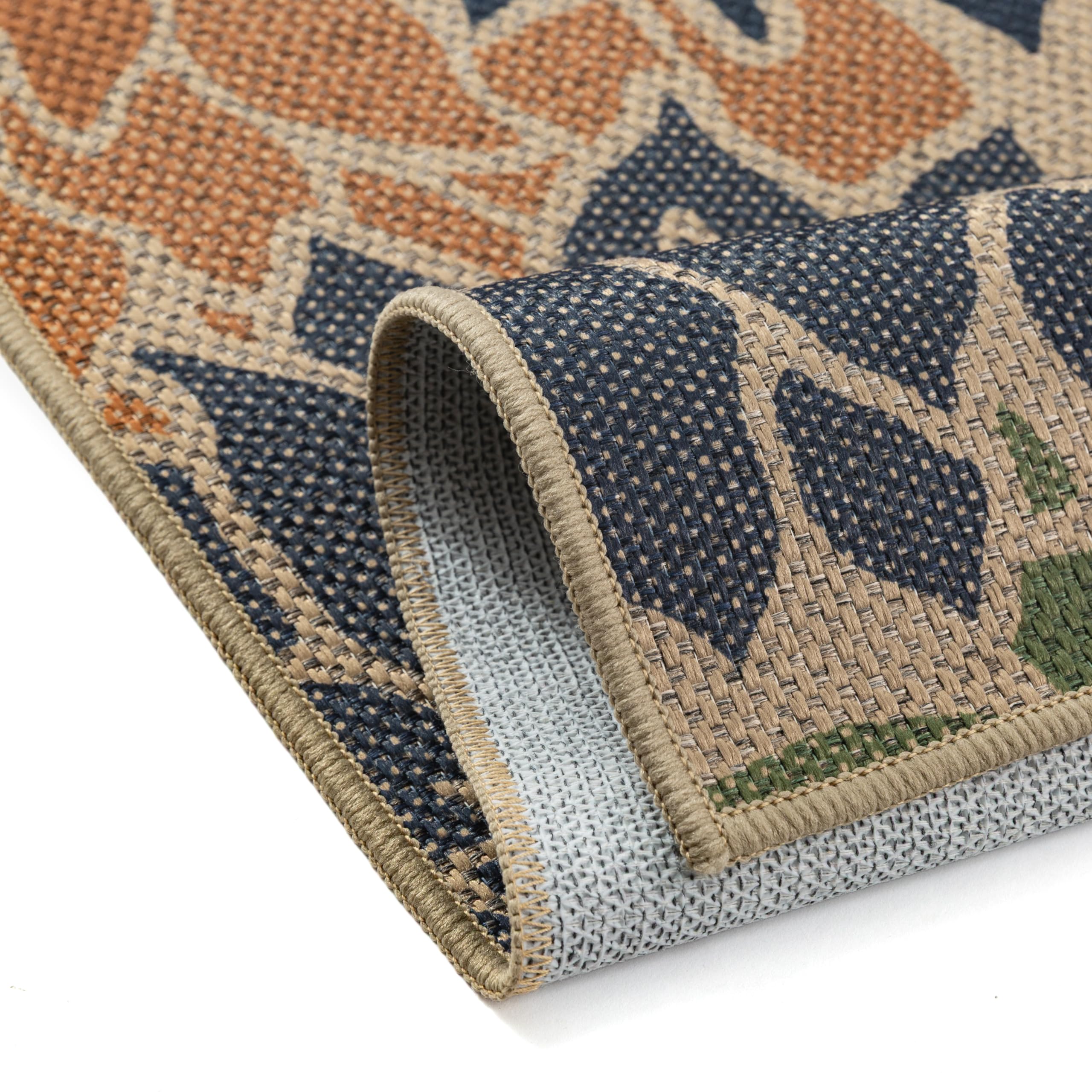 PureCozy 5x7 Outdoor Rug rolled up for storage