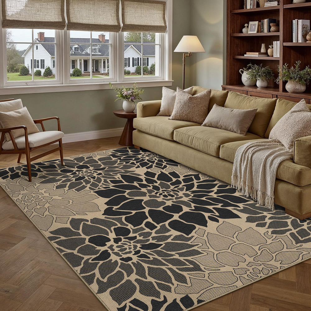 PureCozy 5x8 Black Outdoor Rug on deck with furniture