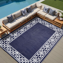 PureCozy 5x8 outdoor rug on a patio setting