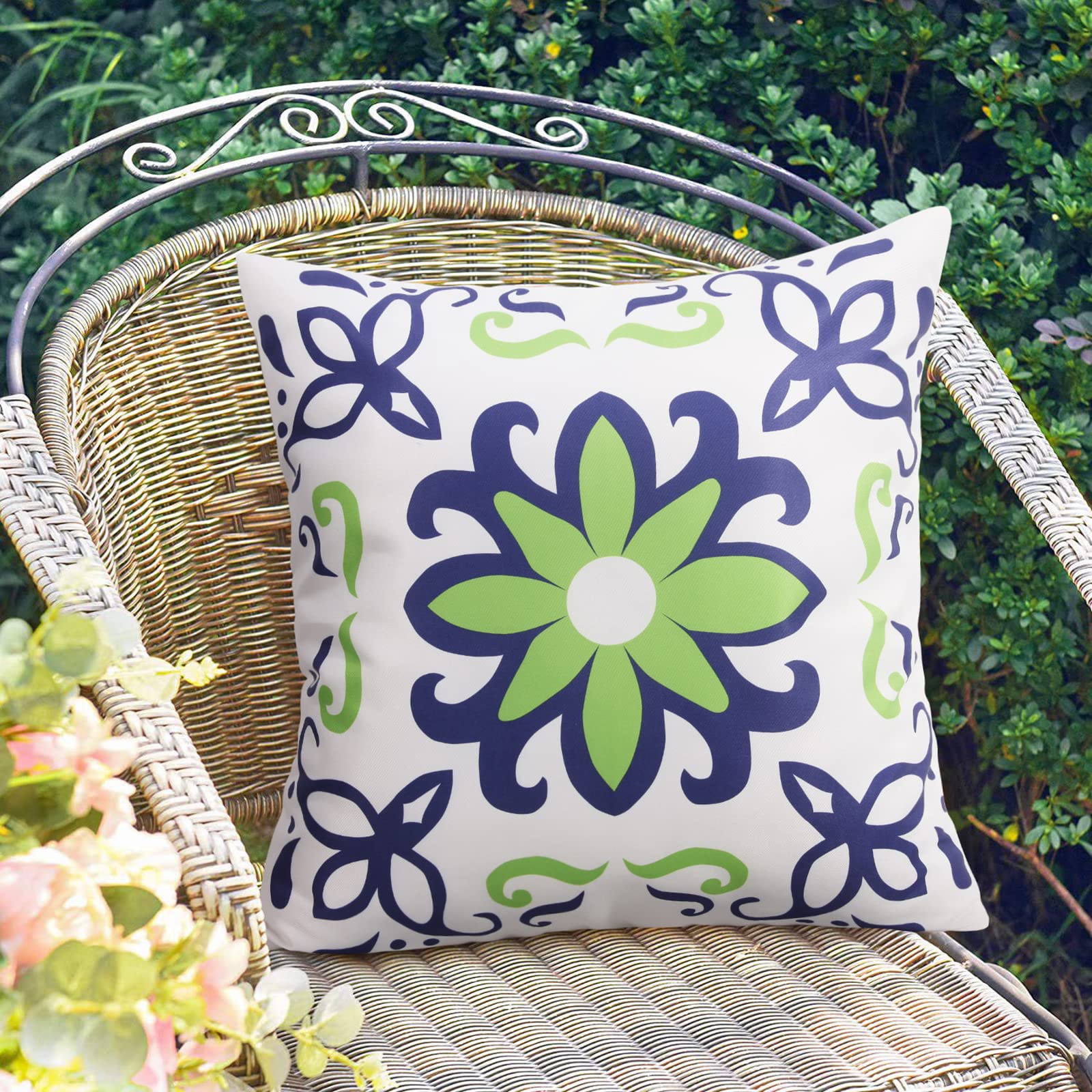 Pyonic outdoor pillow cover set displayed in a garden