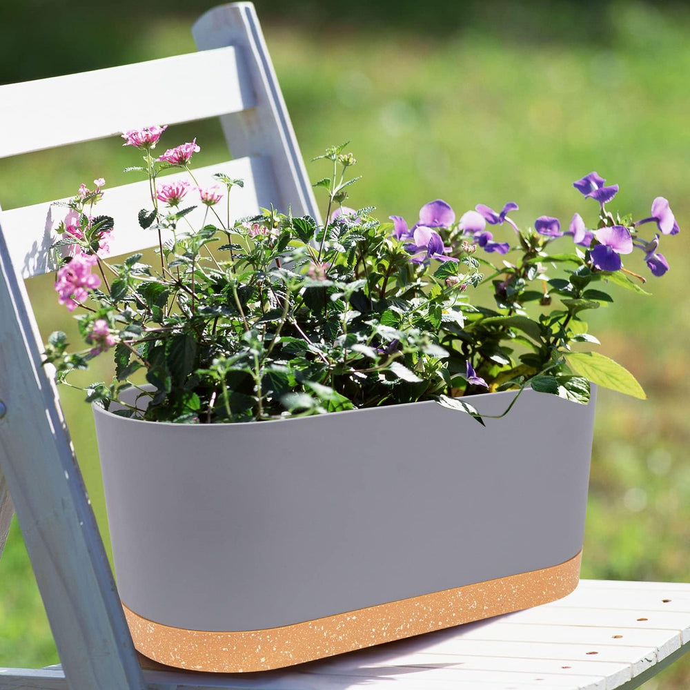 QCQHDU planters displayed on a windowsill with flowers