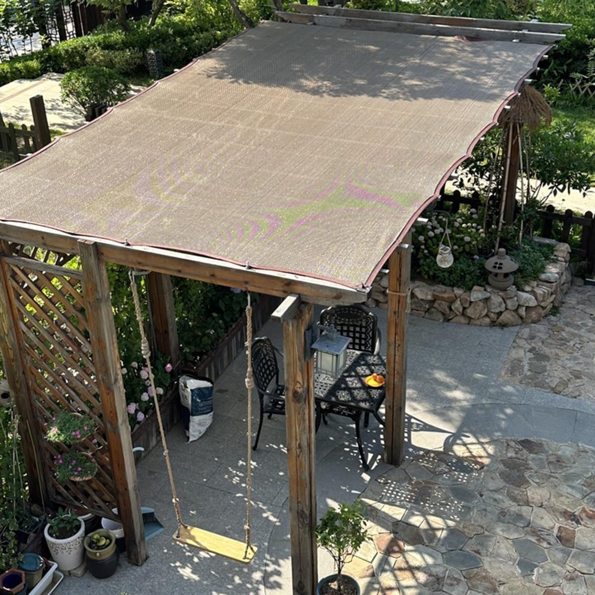 QHAIYYBF shade cloth showing double grommets for installation