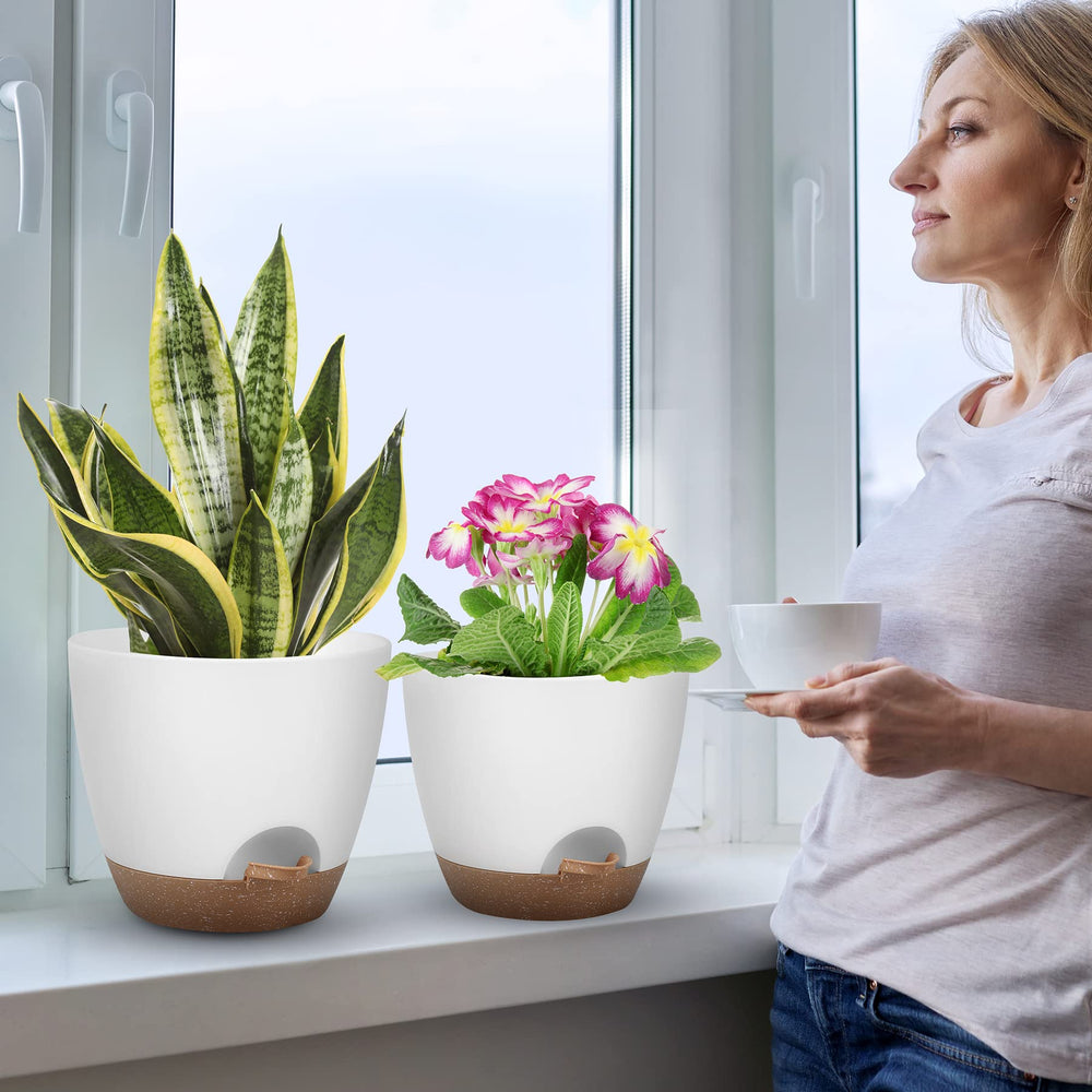 QRRICA plant pots arranged in a modern indoor setting