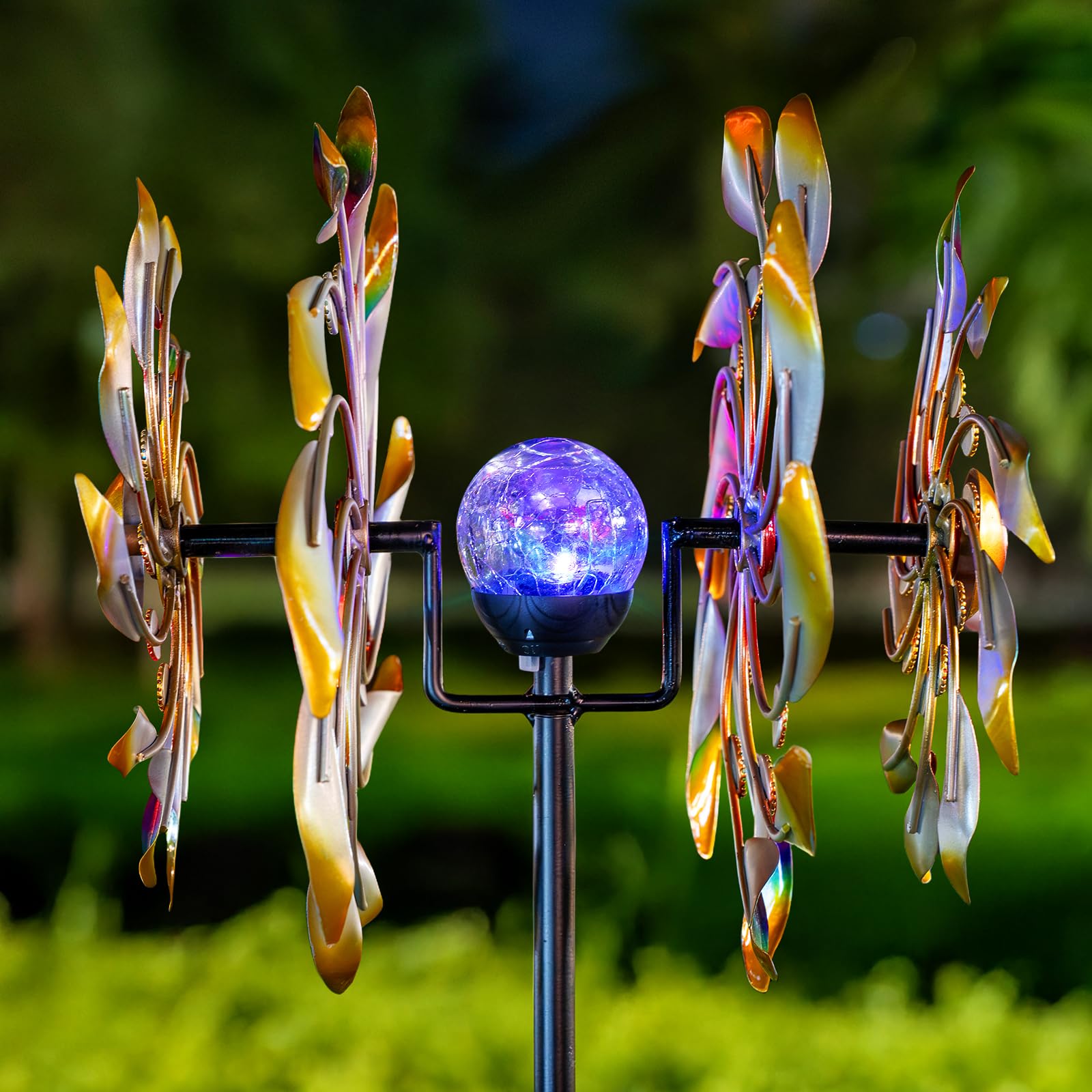 Qualdout wind spinner illuminated at night