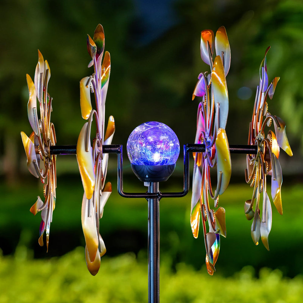 Qualdout wind spinner illuminated at night