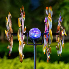 Qualdout wind spinner illuminated at night