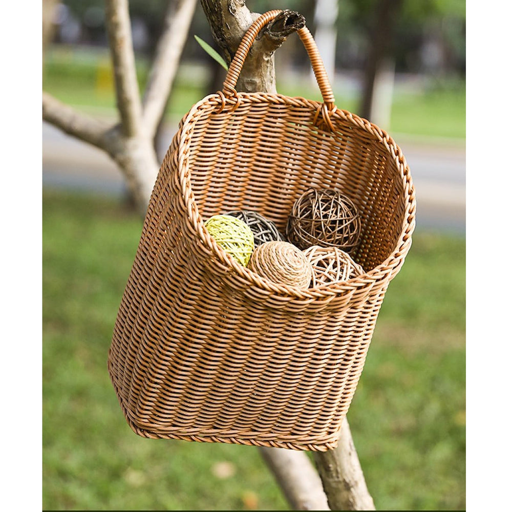 Quincry Wicker Basket hanging on a wall outdoors