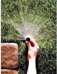 Rain Bird 1803APPRS PRS Pop-Up Sprinkler in a garden setting