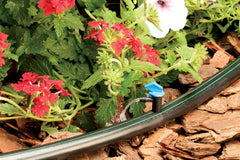 Rain Bird Drip Emitter with twist-off flag top for easy cleaning