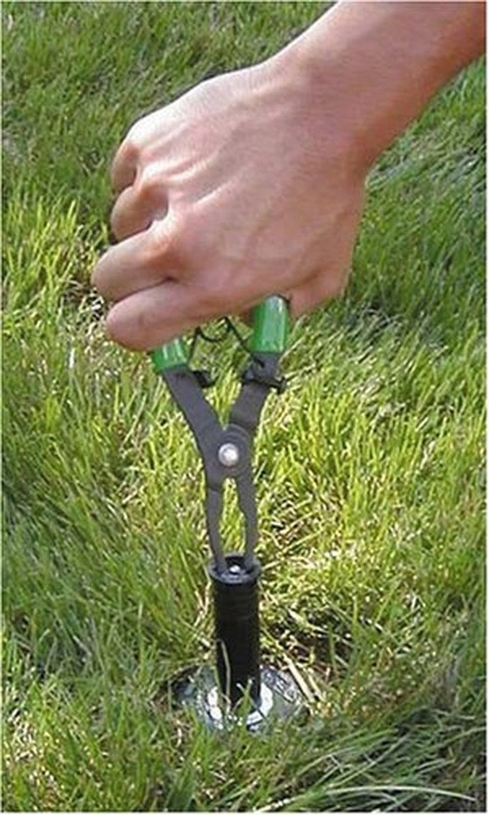 Rain Bird PTC1 tool in use with a pop-up sprinkler