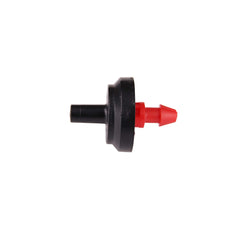 Raindrip Pressure Compensating Dripper installed on tubing