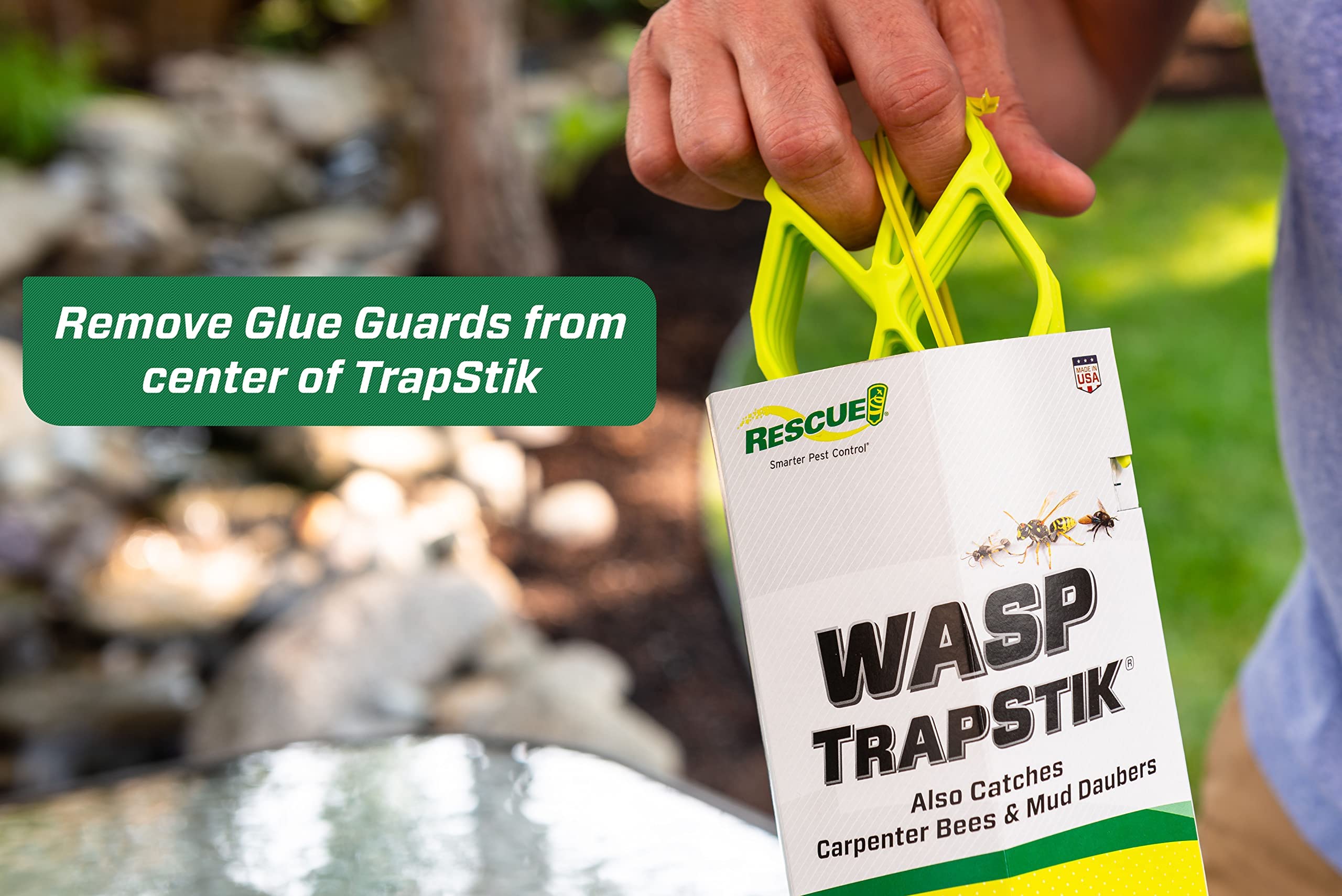 RESCUE! TrapStik in garden setting with insects