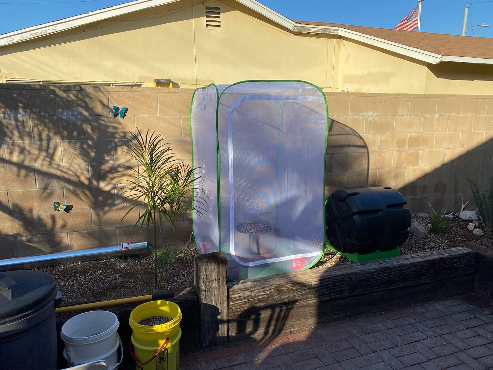RESTCLOUD plant enclosure in garden with vegetables