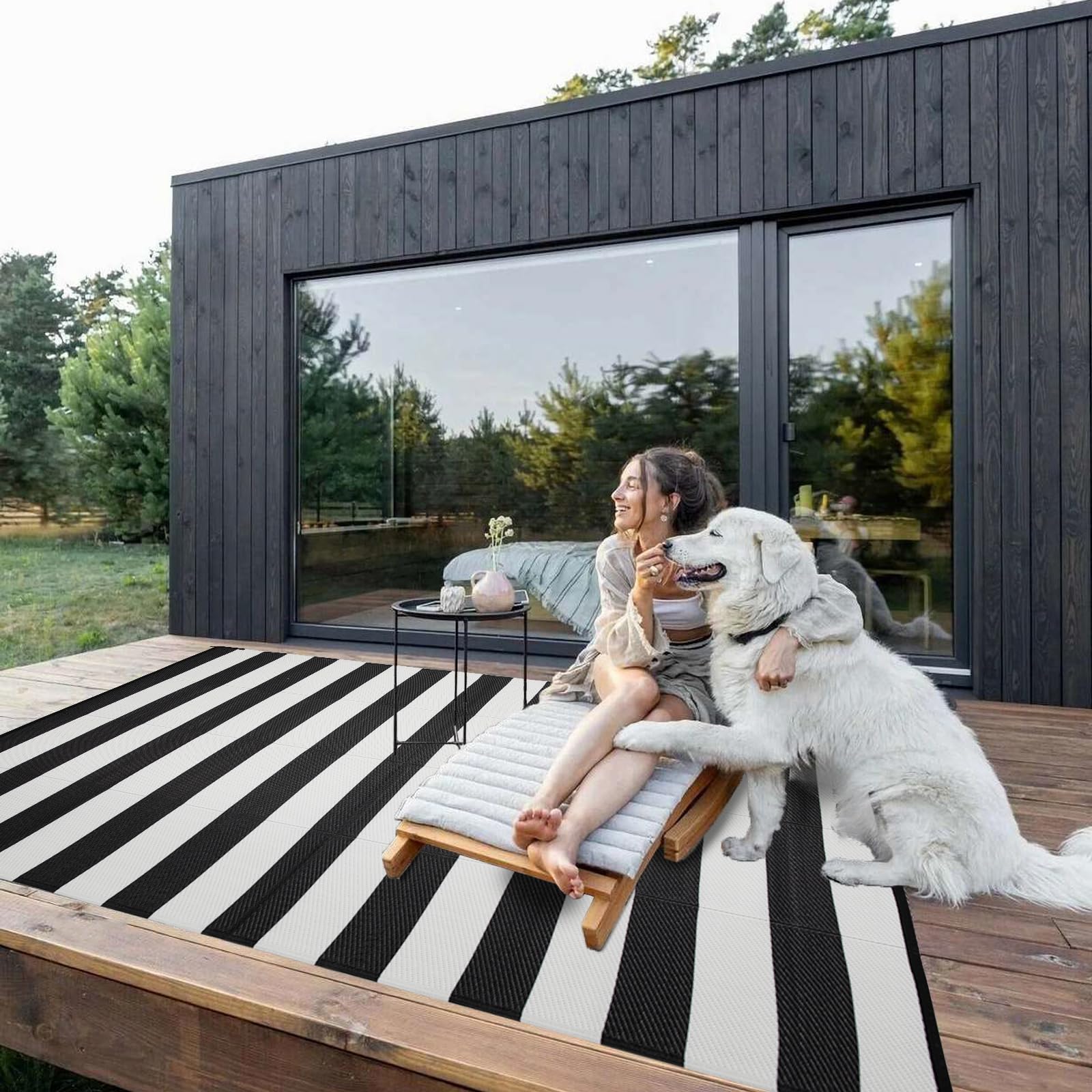 Reversible design of Strickland Home Outdoor Rug shows different patterns