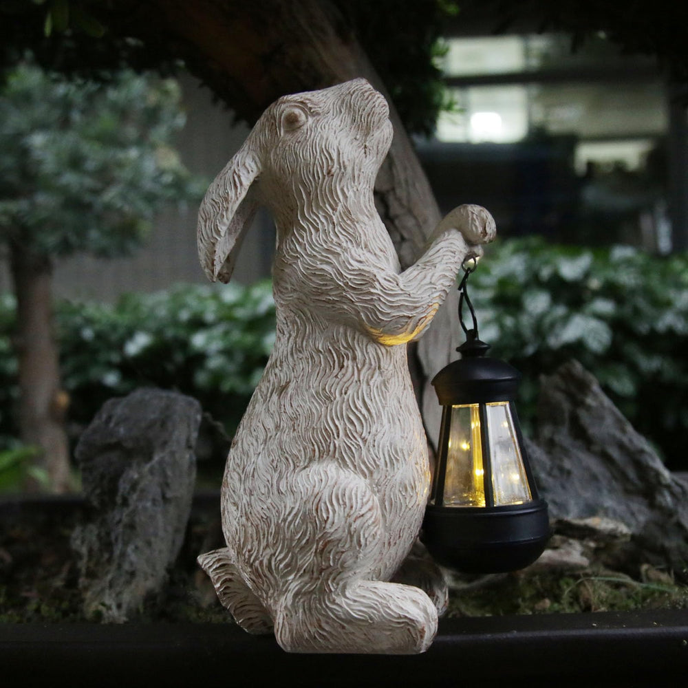 REYISO garden statue with solar lights on patio