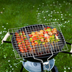 Ribber Fish Grill Basket on an outdoor grill with fish