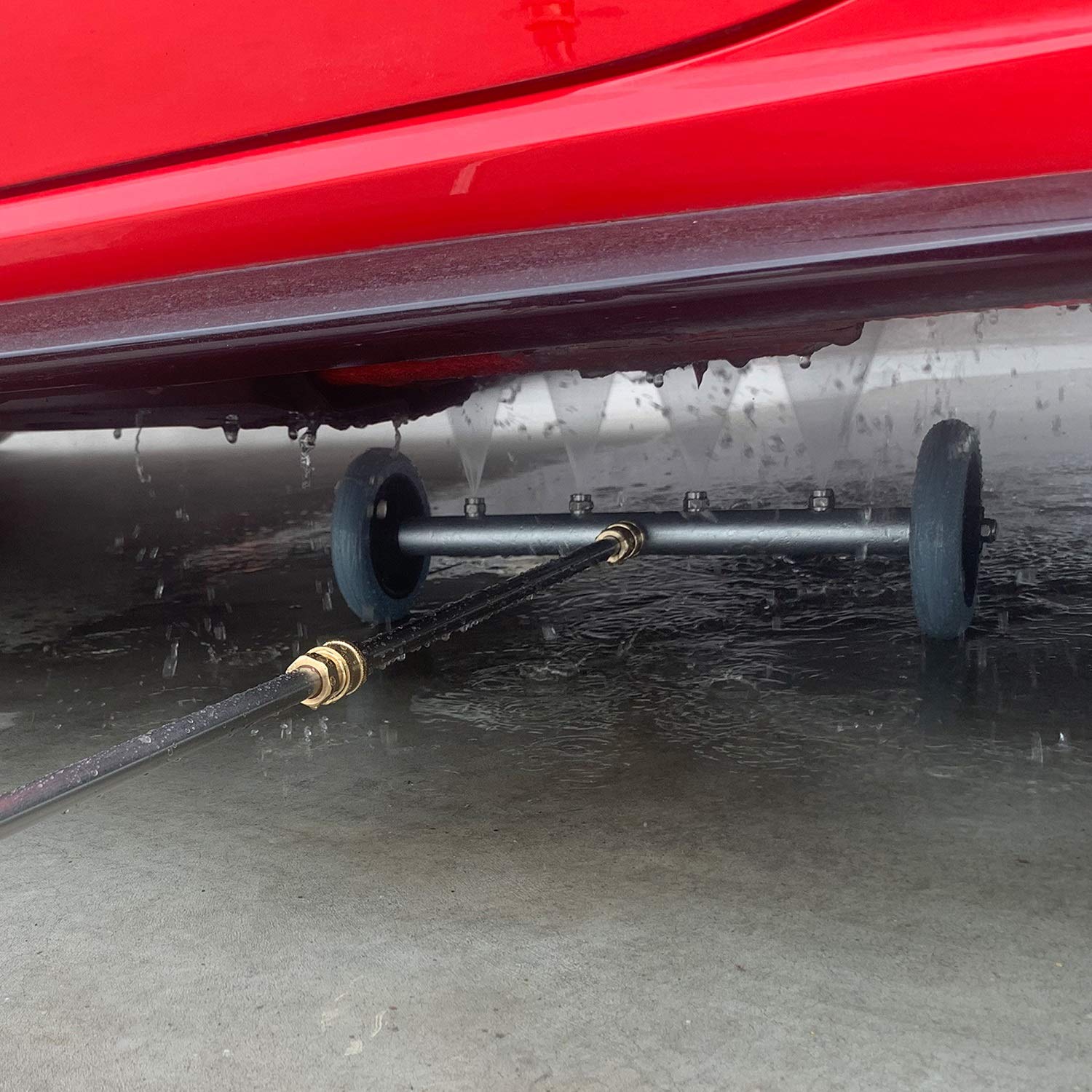 RIDGE WASHER Undercarriage Cleaner in use under a vehicle