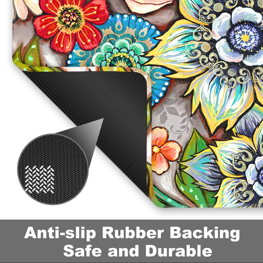 Rnivvi front door mat being cleaned with a garden hose