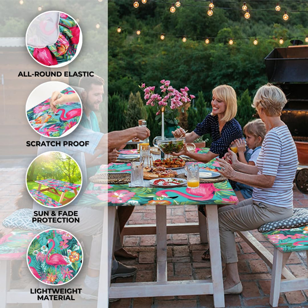 RNOONY picnic table cover on a picnic table in a garden setting
