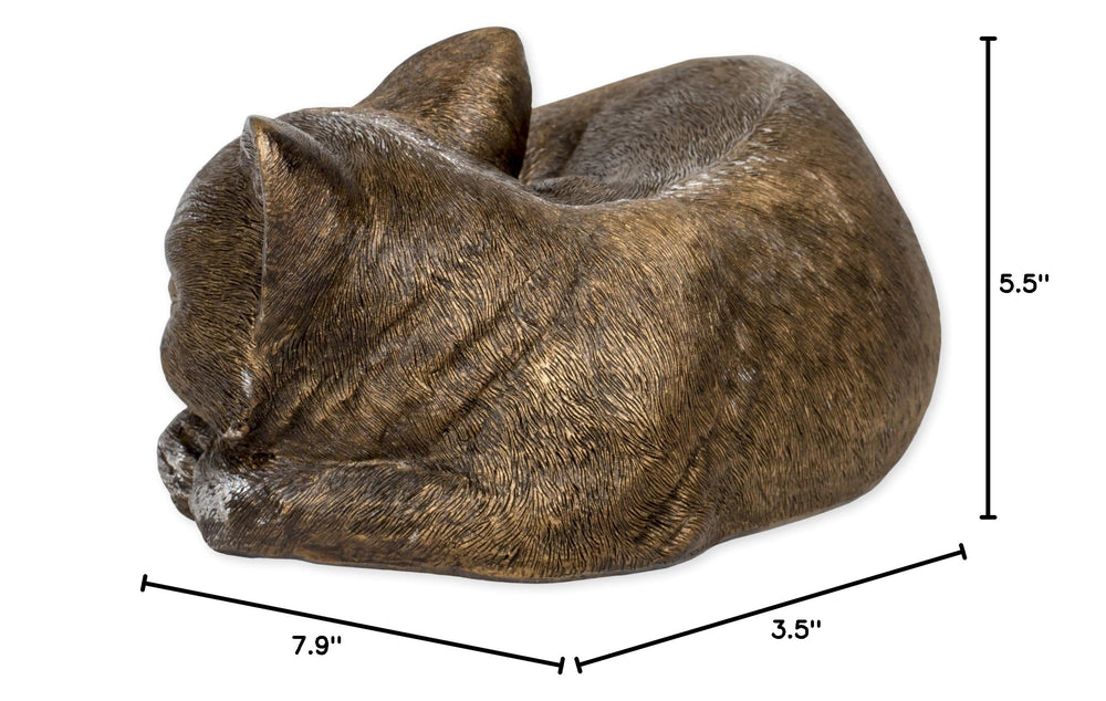 Roman Bronze Sleeping Cat Statue in garden setting