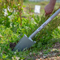 ROOT ASSASSIN shovel in use cutting through roots