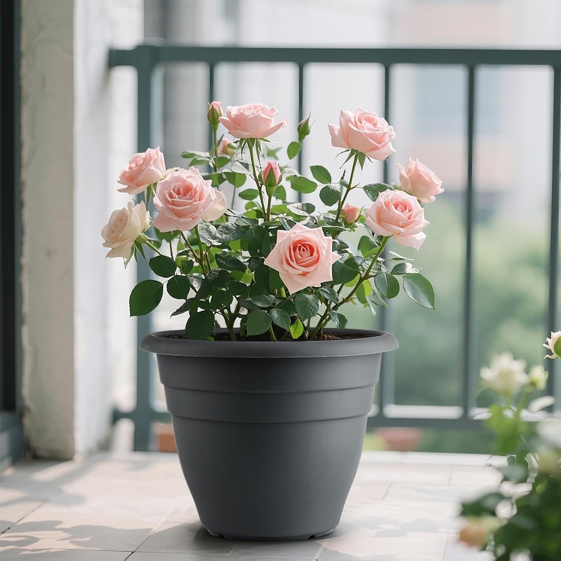RooTrimmer 12 Inch Gray Pot on a patio