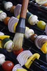 RSVP International BBQ Basting Brush in use on grilled vegetables