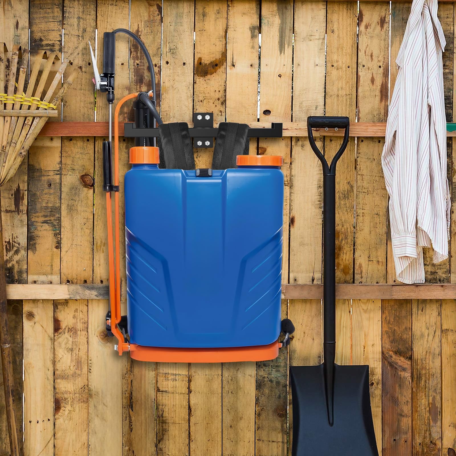 RTOSY Leaf Blower Hanger with tools attached in a garage setting
