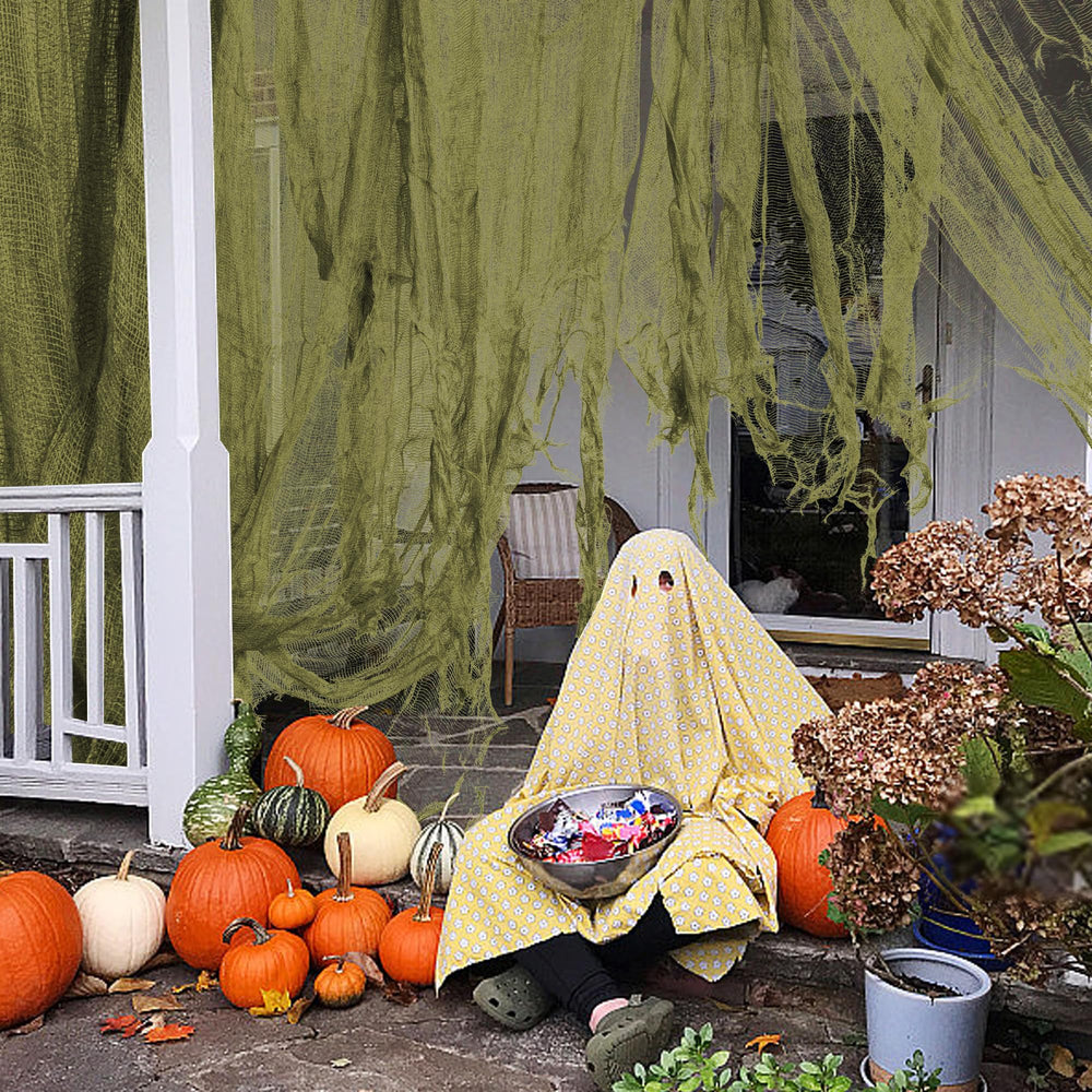 RunNico green gauze cloth hanging outdoors