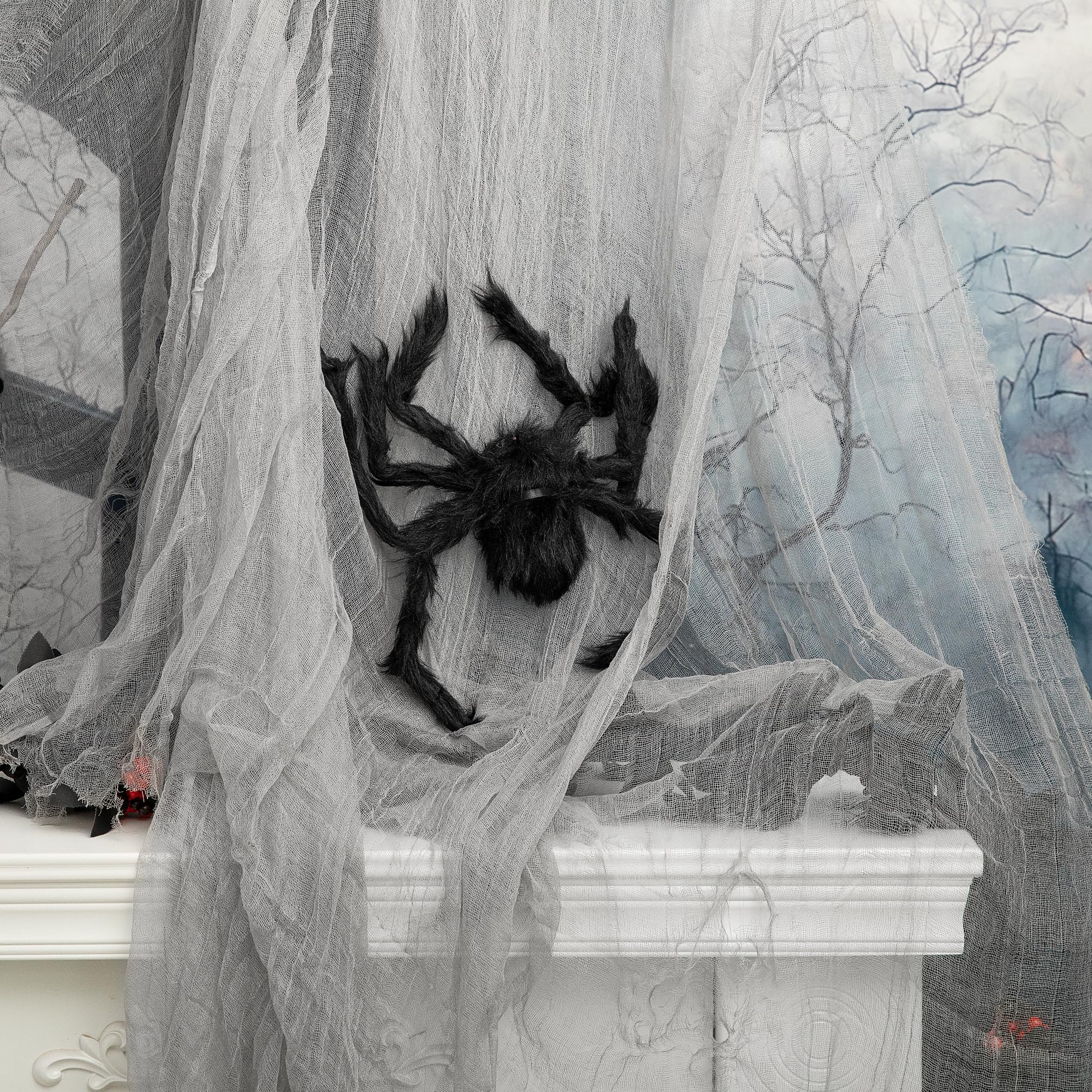 RunNico Large Halloween Creepy Cloth in grey, hanging in a spooky setting