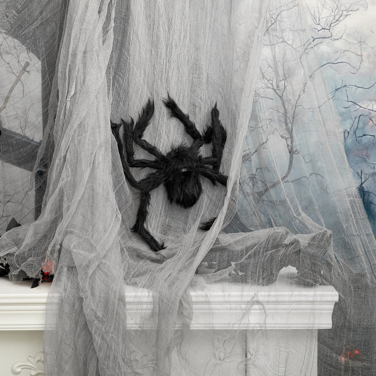 RunNico Large Halloween Creepy Cloth in grey, hanging in a spooky setting