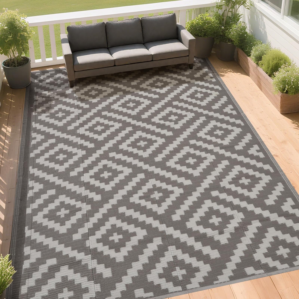 RURALITY 9x12 Outdoor Rug showcasing lightweight material