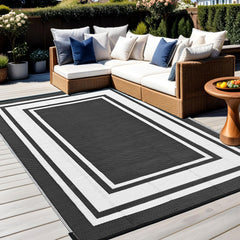 RURALITY outdoor rug black and white on patio