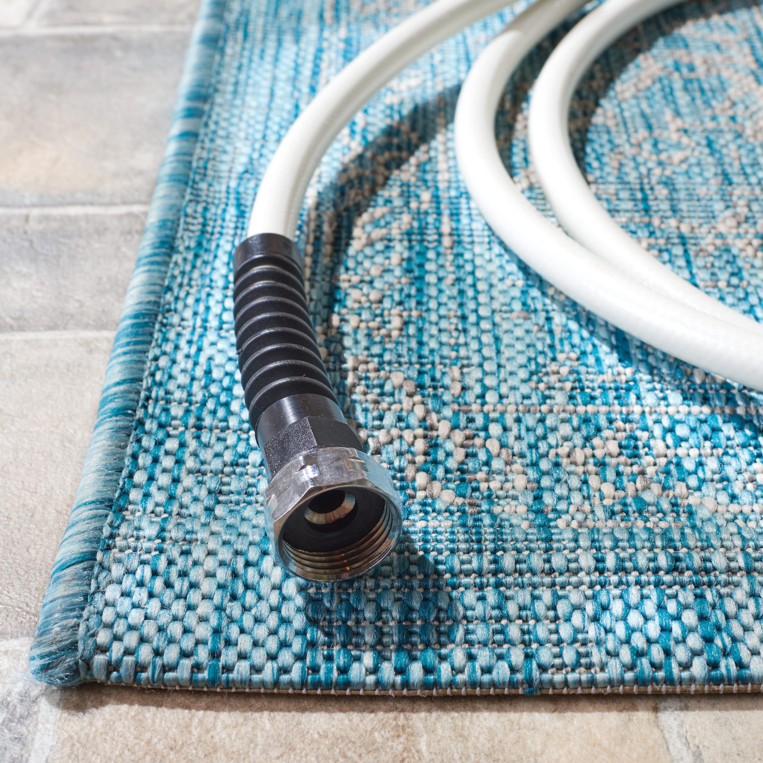 SAFAVIEH 2'3" x 20' rug rolled up for storage