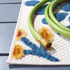 SAFAVIEH Cabana Outdoor Runner Rug on wooden floor