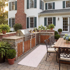 SAFAVIEH Courtyard Collection 2'3" x 8' Soft Pink/Ivory Runner Mat front view