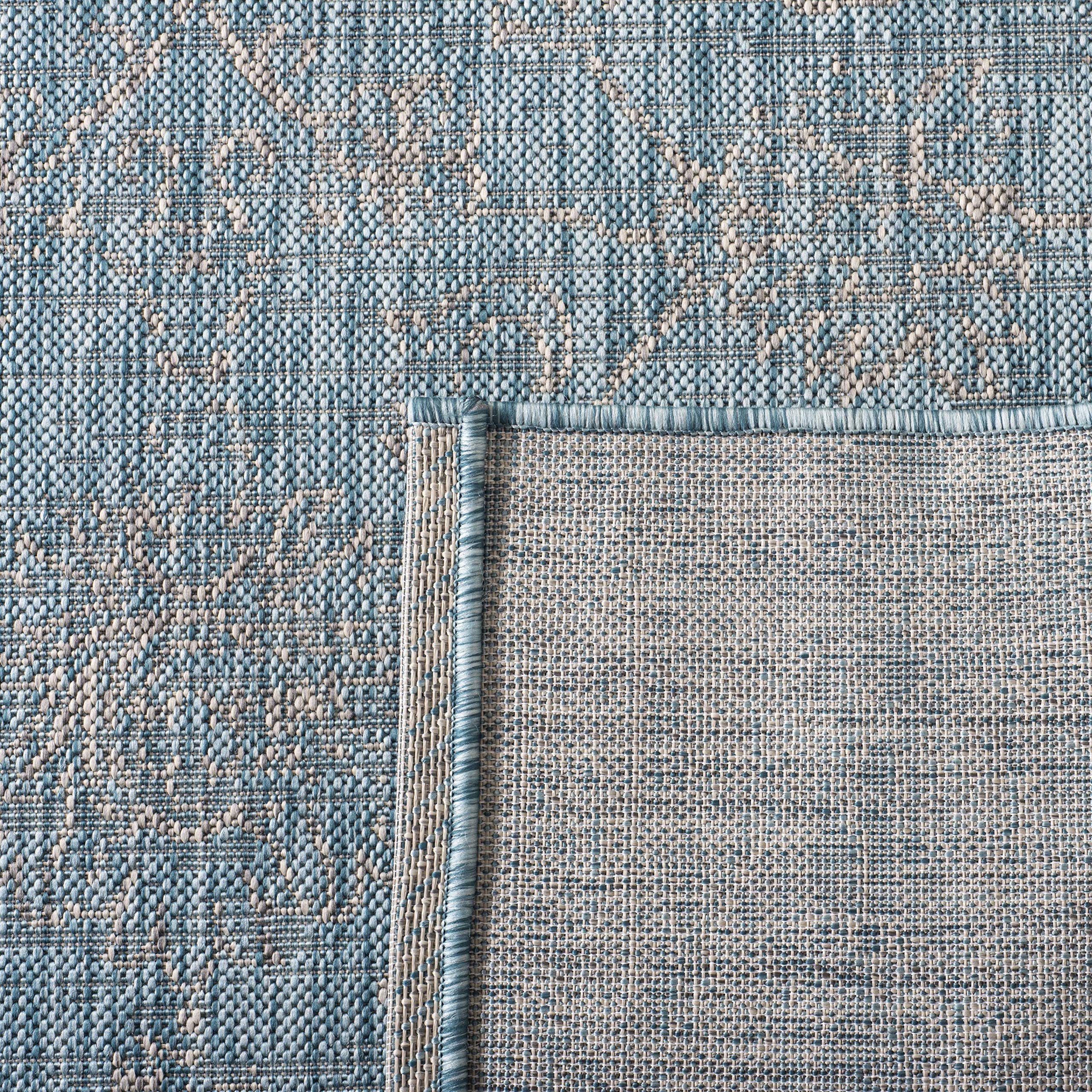 SAFAVIEH Outdoor Rug Aqua/Grey with furniture