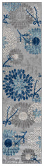SAFAVIEH outdoor rug placed on patio