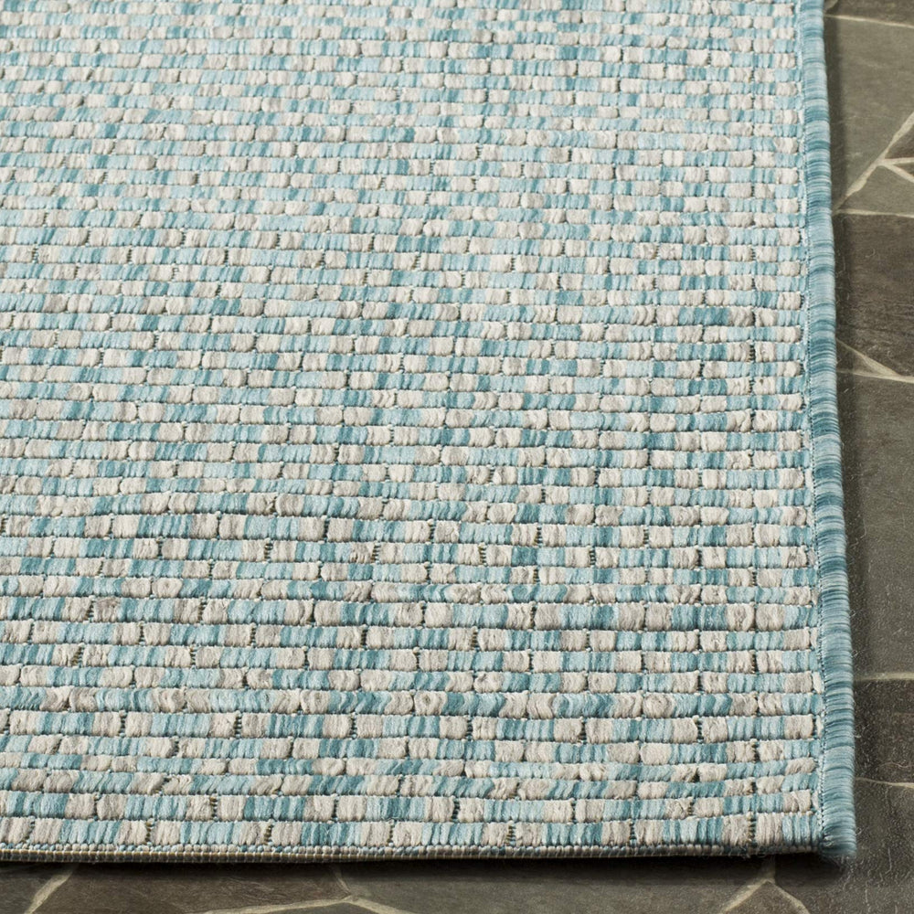 SAFAVIEH Outdoor Rug showing detail of design