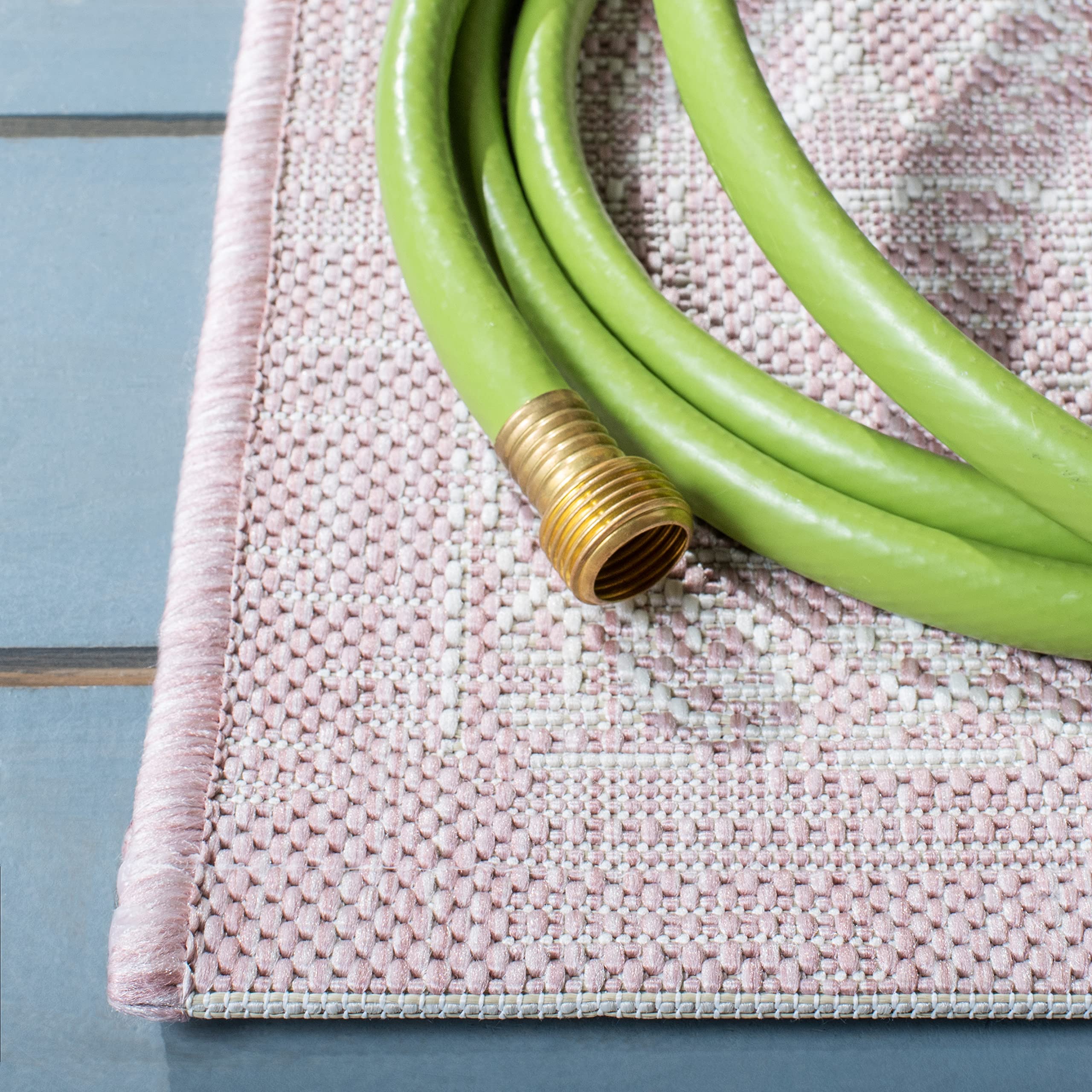 SAFAVIEH runner mat displayed in a mudroom