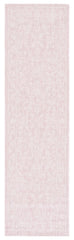 SAFAVIEH Soft Pink/Ivory runner mat in outdoor patio setting