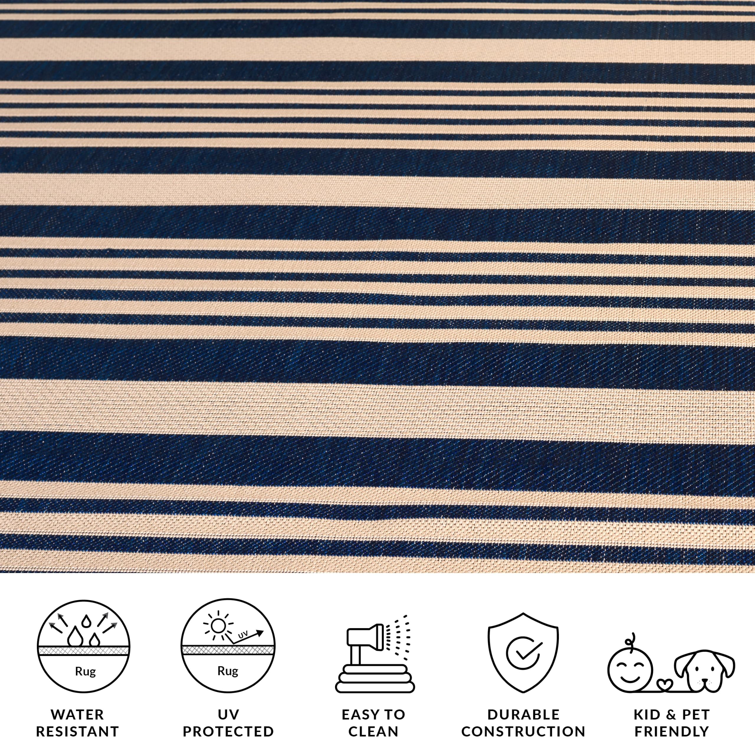 SAFAVIEH Washable Outdoor Rug displayed in sunroom