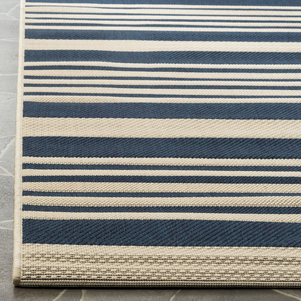 SAFAVIEH Washable Outdoor Rug in patio setting