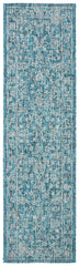 SAFAVIEH Washable Outdoor Rug turquoise in outdoor setting