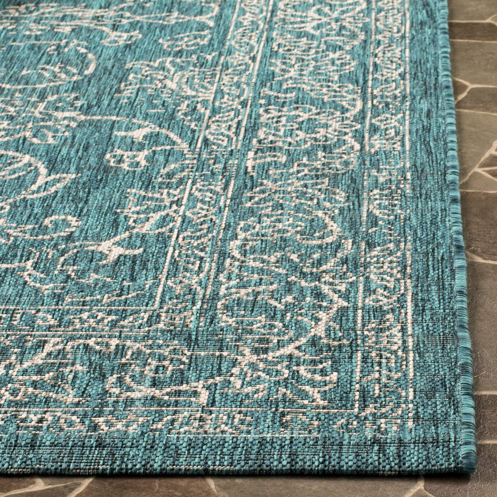 SAFAVIEH Washable Outdoor Rug turquoise in patio decor