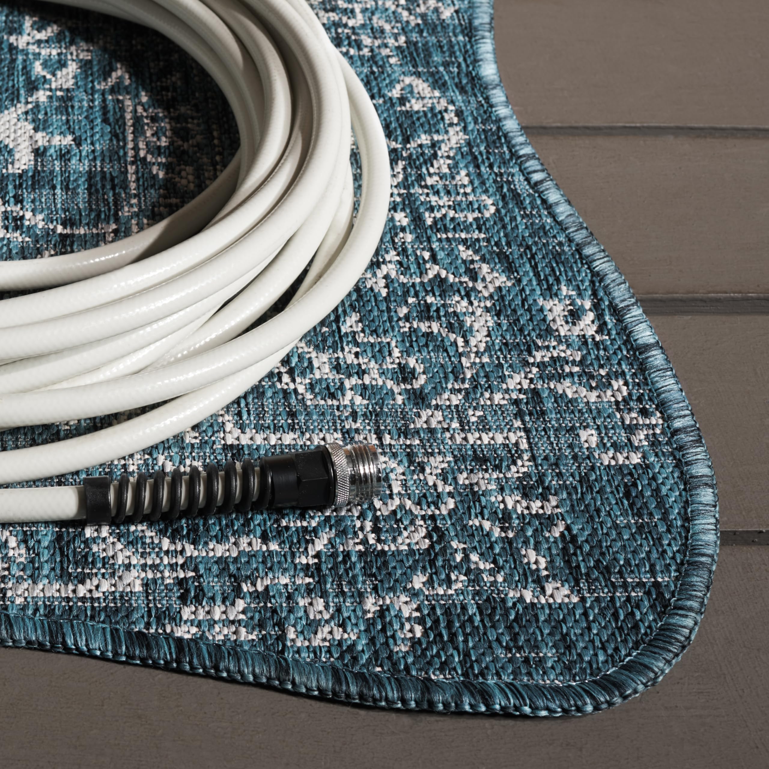 SAFAVIEH Washable Outdoor Runner Rug in living room