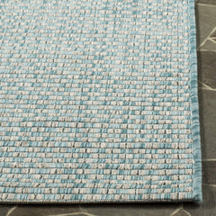 SAFAVIEH Washable Rug displayed on patio