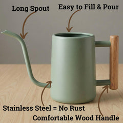 Sage Green watering can with wooden handle close-up