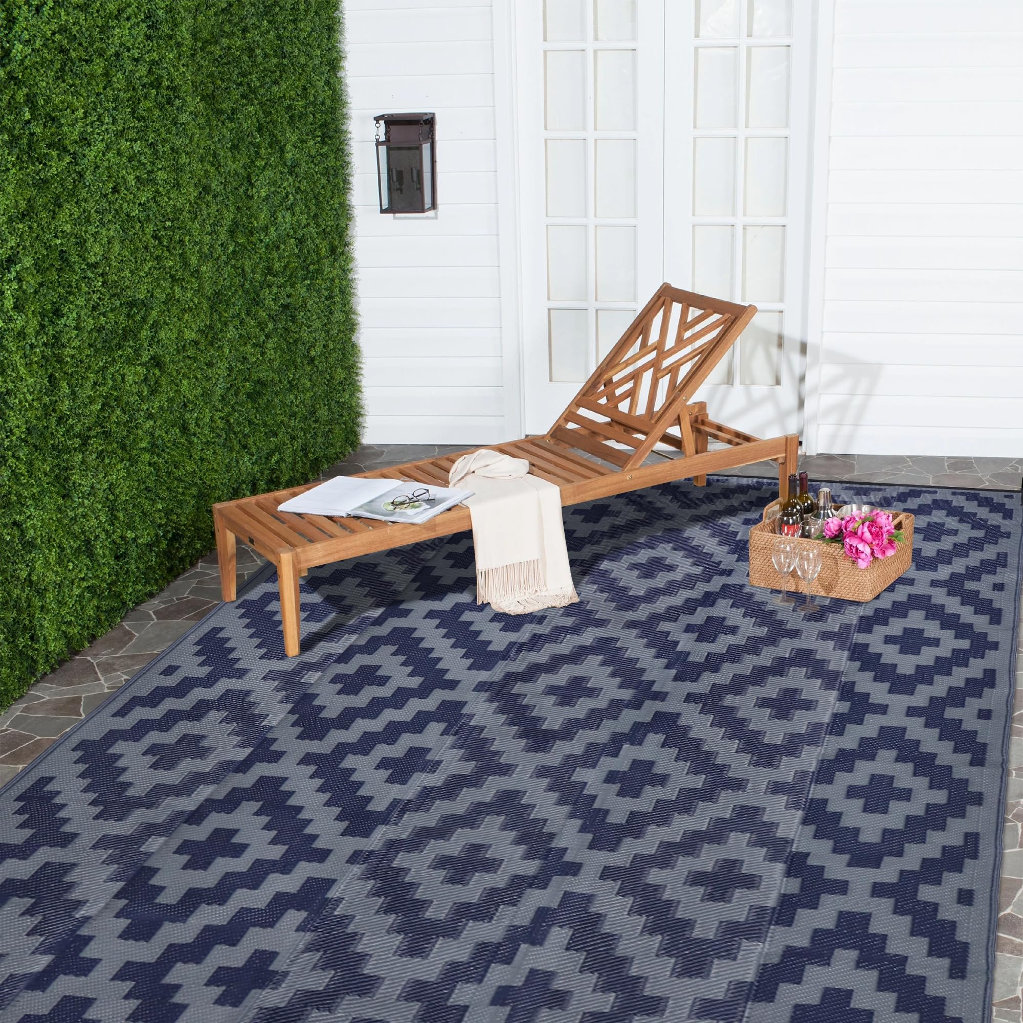 SAND MINE 6' x 9' outdoor rug laid out in garden